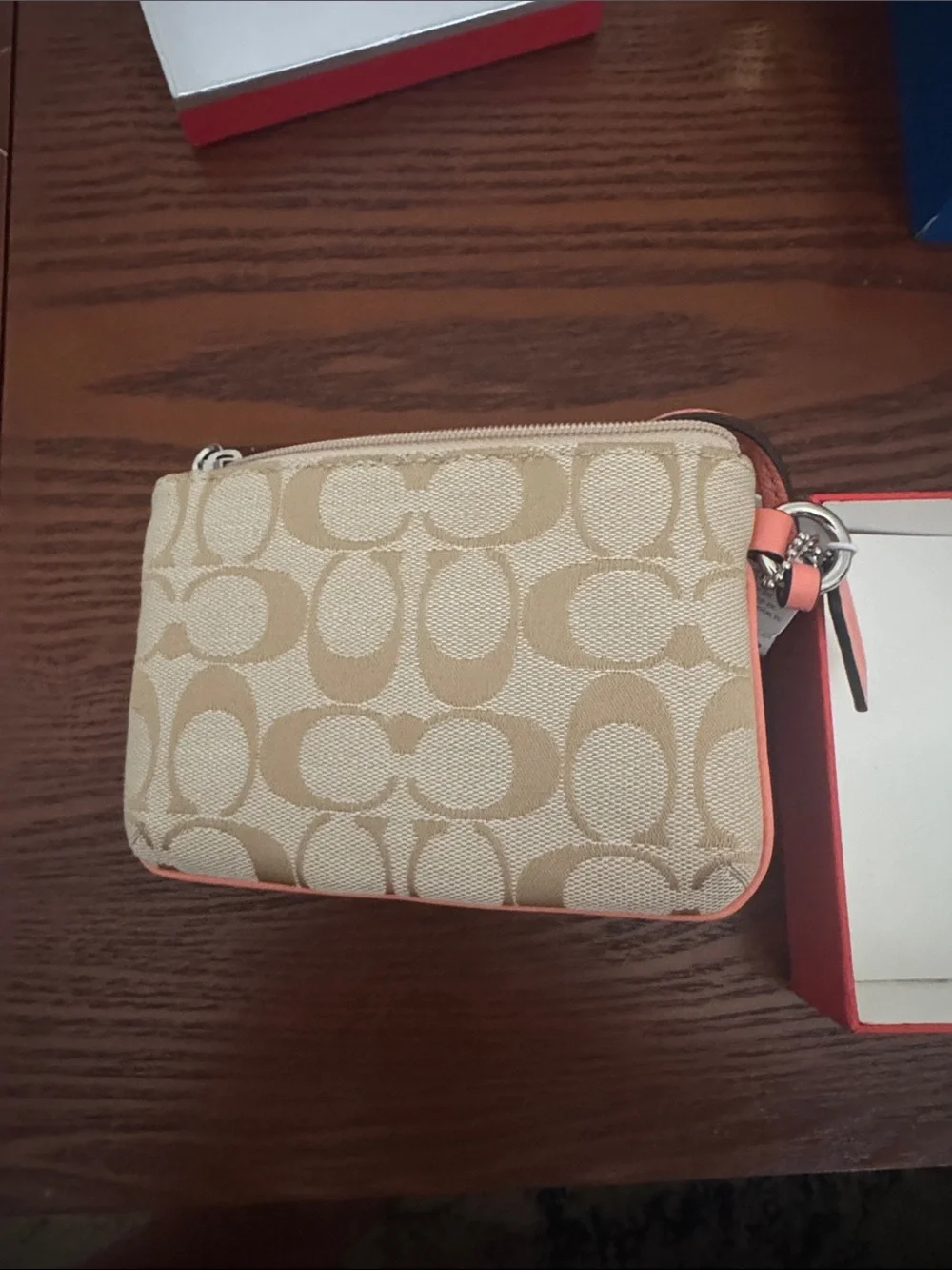 Coach Beige Signature Canvas Wristlet with Coral Stripe